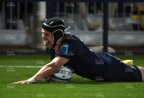 150423 - Edinburgh Rugby v Ospreys - United Rugby Championship - Darcy Graham of Edinburgh celebrates after scoring his second try of the match