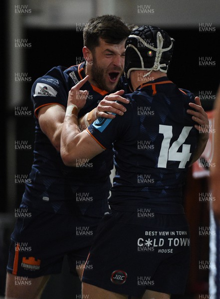 150423 - Edinburgh Rugby v Ospreys - United Rugby Championship - Darcy Graham of Edinburgh celebrates with Blair Kinghorn after scoring his second try of the match