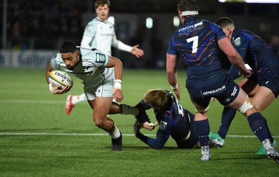 291125 - Edinburgh Rugby v Ospreys - United Rugby Championship - Phil Cokanasiga of Ospreys is hauled down by opposite number Findlay Thomson close to the Edinburgh line
