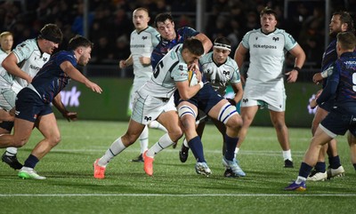 291125 - Edinburgh Rugby v Ospreys - United Rugby Championship - Max Nagy of Ospreys is tackled by Callum Hunter-Hill of Edinburgh