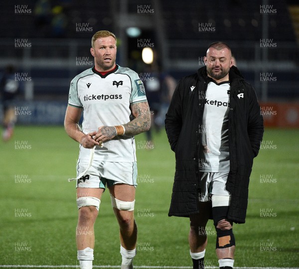 291125 - Edinburgh Rugby v Ospreys - United Rugby Championship - Ross Moriarty of Ospreys and Sam Parry of Ospreys leave the field dejected at the end of the match following a narrow 19-17 defeat