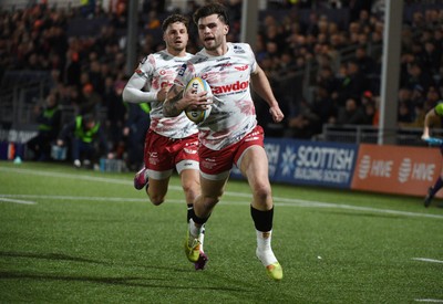 270226 - Edinburgh Rugby v Scarlets - United Rugby Championship - Joe Roberts of Scarlets crosses the line for the Scarlets first try