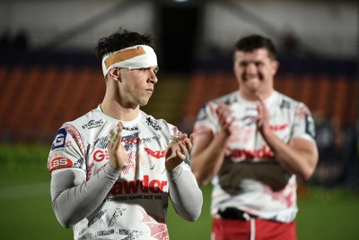 270226 - Edinburgh Rugby v Scarlets - United Rugby Championship - Joe Roberts of Scarlets leaves the field dejected following a 24-19 defeat