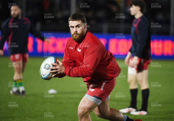 270226 - Edinburgh Rugby v Scarlets - United Rugby Championship - Scarlets players during the pre-match warm up