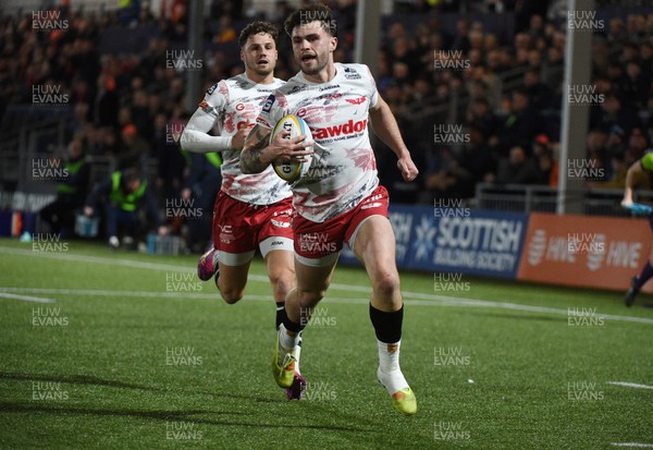 270226 - Edinburgh Rugby v Scarlets - United Rugby Championship - Joe Roberts of Scarlets crosses the line for the Scarlets first try