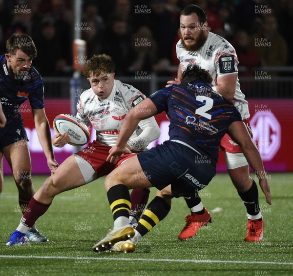 270226 - Edinburgh Rugby v Scarlets - United Rugby Championship - Macs Page of Scarlets cuts inside Harri Morris of Edinburgh hooker (2)