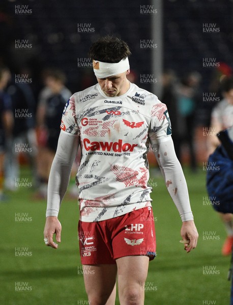 270226 - Edinburgh Rugby v Scarlets - United Rugby Championship - Joe Roberts of Scarlets leaves the field dejected following a 24-19 defeat