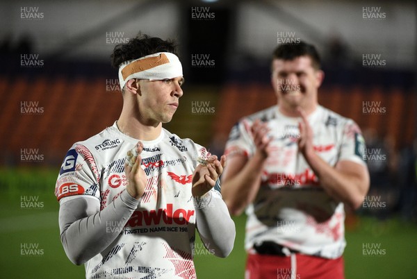 270226 - Edinburgh Rugby v Scarlets - United Rugby Championship - Joe Roberts of Scarlets leaves the field dejected following a 24-19 defeat