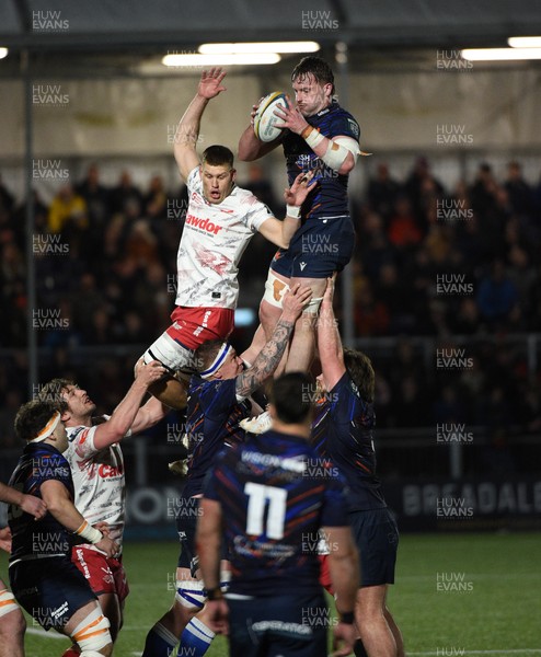 270226 - Edinburgh Rugby v Scarlets - United Rugby Championship - Ben Muncaster of Edinburgh wins a lineout against Jarrod Taylor of Scarlets