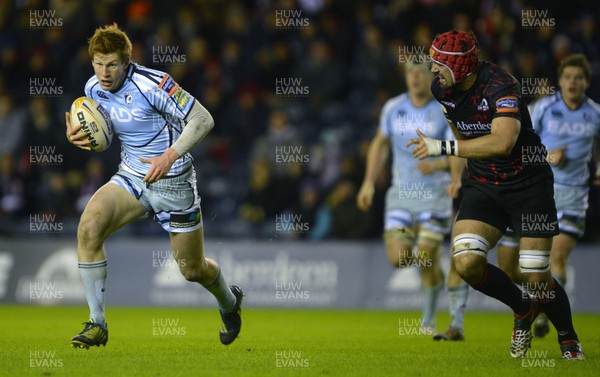 150213 Edinburgh v Blues - RaboDirect Pro12 - Blues' Rhys Patchell gets away from Edinburgh's Izak van der Westhuizen to set up a try 