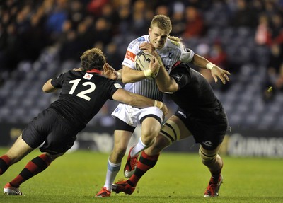 231114 - Edinburgh v Cardiff Blues - Guinness PRO12Cardiff fullback Gareth Anscombe is tackled by Edinburgh's David Denton and Andries Strauss(c) Huw Evans Picture Agency