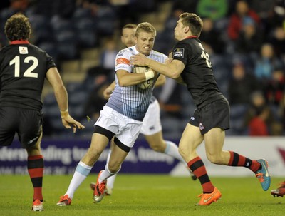 231114 - Edinburgh v Cardiff Blues - Guinness PRO12Cardiff fullback Gareth Anscombe is tackled by Edinburgh's Tom Heathcote(c) Huw Evans Picture Agency