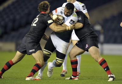 231114 - Edinburgh v Cardiff Blues - Guinness PRO12Cardiff's Manoa Vosawai is tackled by Andries Strauss (12)(c) Huw Evans Picture Agency