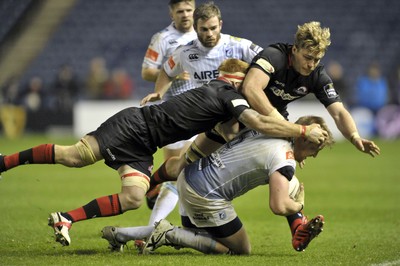 231114 - Edinburgh v Cardiff Blues - Guinness PRO12Edinburgh's David Denton and Roddy Grant tackle Cardiff's Macauley Cook(c) Huw Evans Picture Agency