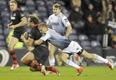 231114 - Edinburgh v Cardiff Blues - Guinness PRO12Edinburgh's Andries Strauss is tackled by Cardiff's Gareth Anscombe(c) Huw Evans Picture Agency