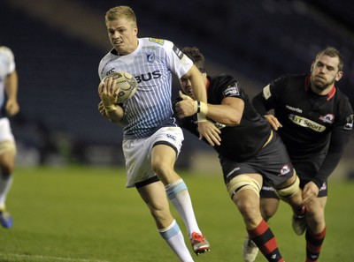 231114 - Edinburgh v Cardiff Blues - Guinness PRO12Gareth Anscombe is tackled by Edinburgh's Ollie Atkins(c) Huw Evans Picture Agency