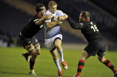 231114 - Edinburgh v Cardiff Blues - Guinness PRO12Gareth Anscombe is tackled by Edinburgh's Ollie Atkins and Neil Cochrane(c) Huw Evans Picture Agency