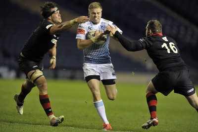 231114 - Edinburgh v Cardiff Blues - Guinness PRO12Gareth Anscombe is tackled by Edinburgh's Ollie Atkins and Neil Cochrane(c) Huw Evans Picture Agency