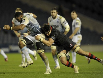 231114 - Edinburgh v Cardiff Blues - Guinness PRO12Cardiff's Manoa Vosawai is tackled by Edinburgh's Ollie Atkins(c) Huw Evans Picture Agency