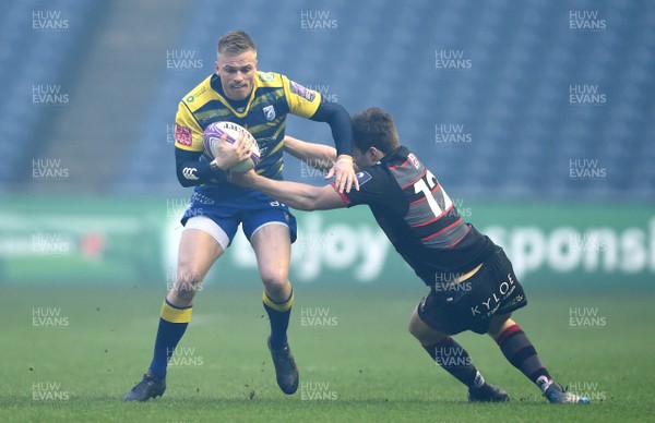 310318 - Edinburgh v Cardiff Blues - European Rugby Challenge Cup - Gareth Anscombe of Cardiff Blues is tackled by Chris Dean of Edinburgh