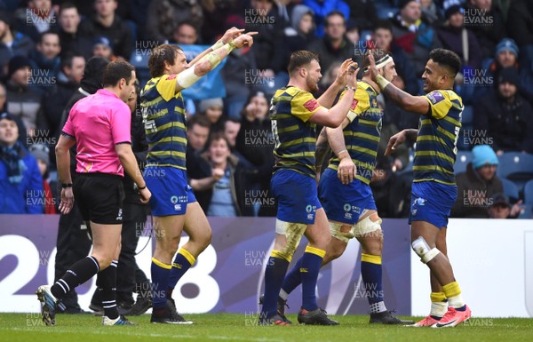 310318 - Edinburgh v Cardiff Blues - European Rugby Challenge Cup - Blaine Scully (left) of Cardiff Blues celebrates his try with team mates