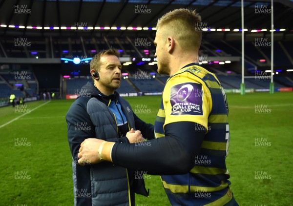 310318 - Edinburgh v Cardiff Blues - European Rugby Challenge Cup - Cardiff Blues coach Danny Wilson celebrates with Gareth Anscombe of Cardiff Blues