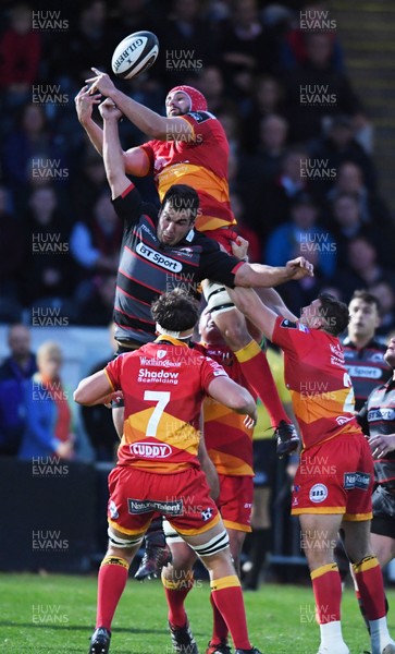 080917 - Edinburgh Rugby v Dragons - Guinness PRO14 -   Cory Hill - Dragons captain beats Stuart MacInally to a high ball