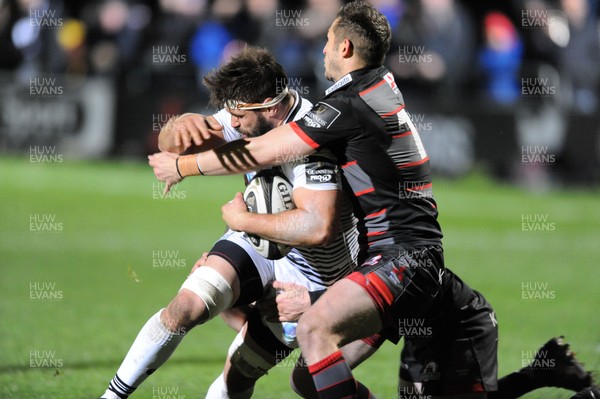 041117 - Edinburgh Rugby v Ospreys - Guinness PRO14 -  Guy Mercer of Ospreys is wrapped up in the tackle of Jason Tovey as he drives for the Edinburgh line