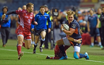 261019 - Edinburgh Rugby v Scarlets - Guinness PRO14 -  Eroni Sau of Edinburgh tackled by Dan Jones of Scarlets