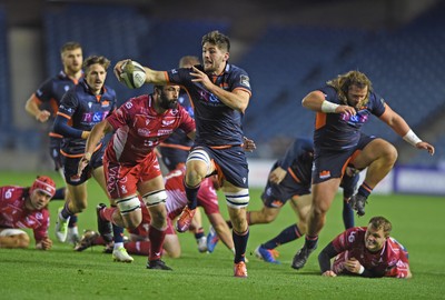 261019 - Edinburgh Rugby v Scarlets - Guinness PRO14 -  Ally Miller of Edinburgh runs past Uzair Cassiem of Scarlets