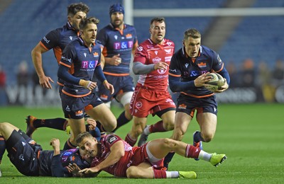 261019 - Edinburgh Rugby v Scarlets - Guinness PRO14 -  Kieran Hardy of Scarlets grounded and Mark Bennett of Edinburgh