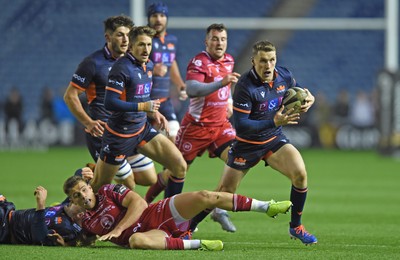 261019 - Edinburgh Rugby v Scarlets - Guinness PRO14 -  Kieran Hardy of Scarlets grounded and Mark Bennett of Edinburgh