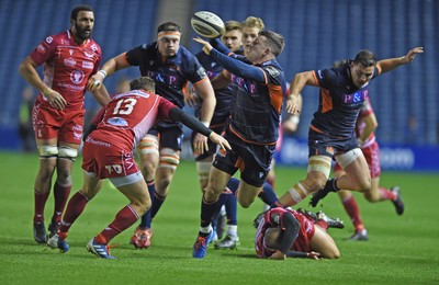 261019 - Edinburgh Rugby v Scarlets - Guinness PRO14 -  Steff Hughes of Scarlets, Matt Scott of Edinburgh  and Johnny McNicholl of Scarlets