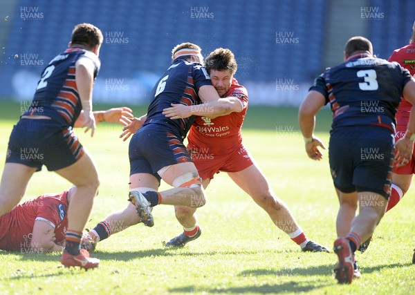 270221 - Edinburgh Rugby v Scarlets - Guinness PRO14 - Marc Jones of Scarlets tackles Nick Haining