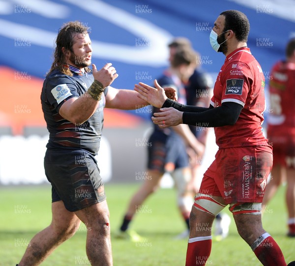 270221 - Edinburgh Rugby v Scarlets - Guinness PRO14 - Ozair Cassiem of Scarlets hugs Pierre Schoeman at the end of the match