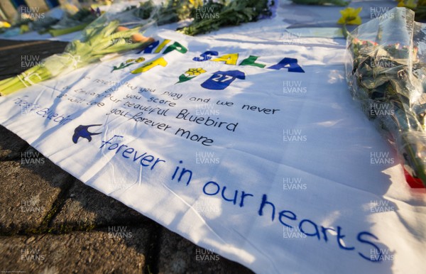 210120 - Tributes are laid and written to Emiliano Sala outside the Cardiff City Stadium on the first anniversary of the plane crash which claimed his life while travelling to Cardiff from Nantes Sala was due to meet up with new team mates after signing for Cardiff City from Nantes