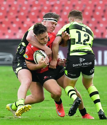 180125  Emirates Lions v Dragons RFC, EPCR Challenge Cup - Quan Horn of the Lions is tackled by Brodie Coghlan of Dragons and Aneurin Owen of Dragons