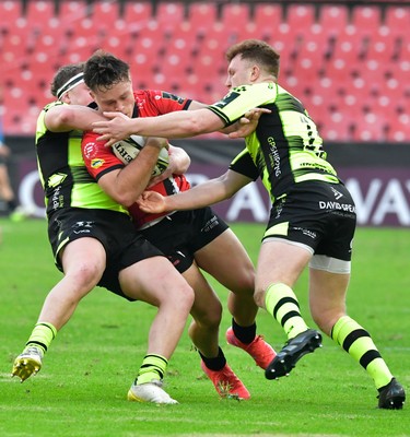 180125  Emirates Lions v Dragons RFC, EPCR Challenge Cup - Quan Horn of the Lions is tackled by Brodie Coghlan of Dragons and Aneurin Owen of Dragons