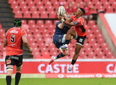 280326 - Fidelity SecureDrive Lions v Dragons RFC, United Rugby Championship - Angelo Davids of Lions and  Angus O'Brien of Dragons compete for the ball