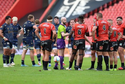 280326 - Fidelity SecureDrive Lions v Dragons RFC, United Rugby Championship - Referee Robbie Jenkinson speaks to the players