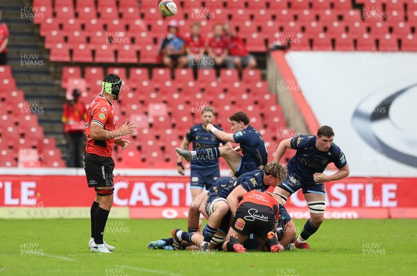 280326 - Fidelity SecureDrive Lions v Dragons RFC, United Rugby Championship - Niall Armstrong of Dragons RFC kicks clear