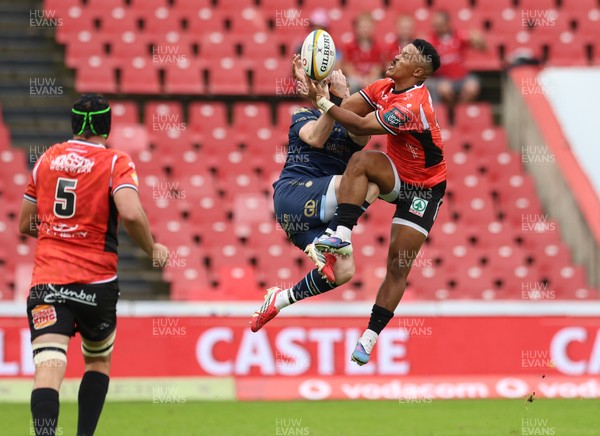 280326 - Fidelity SecureDrive Lions v Dragons RFC, United Rugby Championship - Angelo Davids of Lions and  Angus O'Brien of Dragons compete for the ball