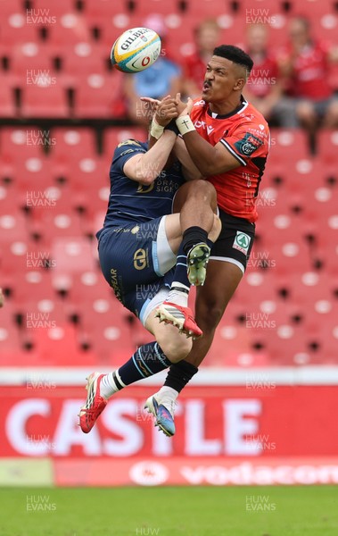 280326 - Fidelity SecureDrive Lions v Dragons RFC, United Rugby Championship - Angelo Davids of Lions and  Angus O'Brien of Dragons compete for the ball