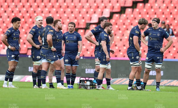 280326 - Fidelity SecureDrive Lions v Dragons RFC, United Rugby Championship - Dragons players during a break in play