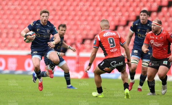 280326 - Fidelity SecureDrive Lions v Dragons RFC, United Rugby Championship - Angus O’Brien of Dragons RFC takes on Nico Steyn of Lions