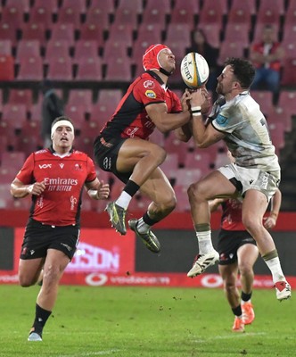 170525 - Emirates Lions v Ospreys - United Rugby Championship - Edwill Van Der Merwe of the Lions and Luke Morgan of Ospreys fight for ball possession