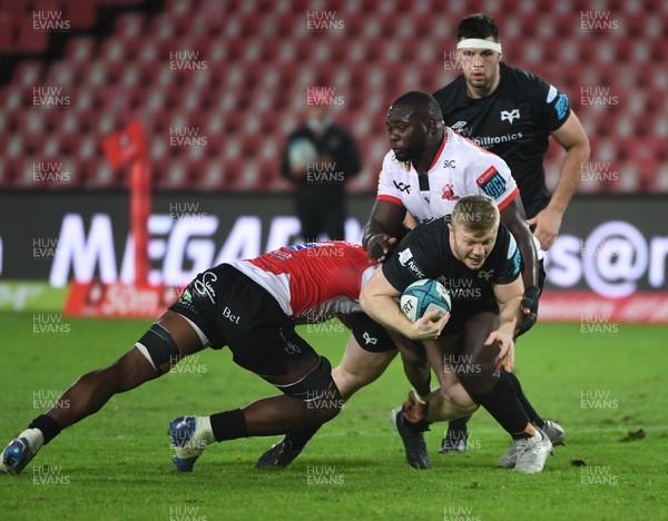 250322 - Emirates Lions v Ospreys - United Rugby Championship - William Keiran of the Ospreys is tackled