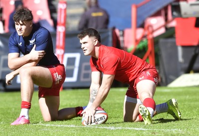 110525 - Emirates Lions v Scarlets - United Rugby Championship - Teams warming up ahead of start