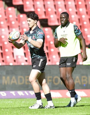 110525 - Emirates Lions v Scarlets - United Rugby Championship - Teams warming up ahead of start