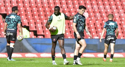 110525 - Emirates Lions v Scarlets - United Rugby Championship - Teams warming up ahead of start